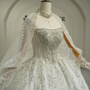 Robe de mariée moderne GT26061 à col bateau, ornée de sequins et de perles, avec traîne chapelle et dentelle florale - Product Image 5