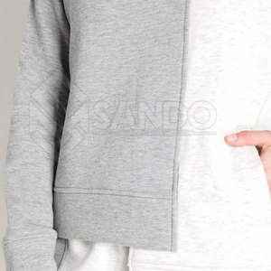 ชุดวอร์มผู้หญิงแบบมีฮู้ด 2 ชิ้น ผ้าโพลีเอสเตอร์ 100% แห้งเร็ว แขนยาว สไตล์ลำลอง ลายเรียบ สำหรับฤดูหนาว ขายส่ง - Product Image 5