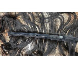 Extensions de cheveux ondulés de haute qualité, texture soyeuse, longueur longue, soutien de coiffage pour une présentation de mode tendance - Product Image 5