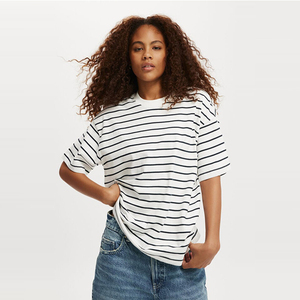OEM venta al por mayor de alta calidad de verano ligero desgaste de tamaño regular hombro caído de moda liso camisetas de las mujeres - Product Image 1