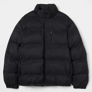 Veste matelassée chaude d'hiver pour hommes taille personnalisée couleur unie toile tissu vente en gros manteau d'extérieur veste rembourrée - Product Image 1