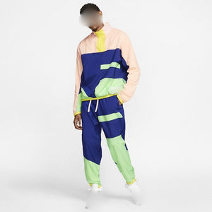 ชุดเสื้อกันลมและกางเกงสำหรับผู้ชายชุดวอร์มหลากสีสำหรับออกกำลังกาย - Product Image 4