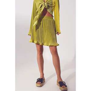 Falda corta plisada verde con corte en A y cintura natural - Product Image 4