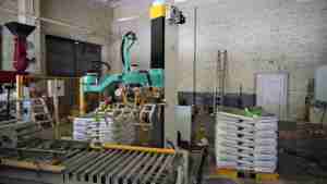 Ligne d'emballage avec un palettiseur robotisé et un système de convoyage - Product Image 3