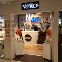 Comptoir de bar moderne personnalisé en Corian avec logo LED, mobilier de comptoir pour café commercial