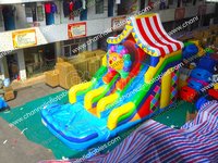 Aire de jeux gonflable à thème Carnaval Cirque avec toboggan aquatique double piste, piscine et échelle d'escalade, château gonflable pour fêtes