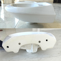 Lavabo rond en céramique blanc 18x13 de United Industries, avec une construction durable pour la salle de bain à domicile, luxe minimaliste