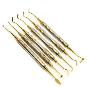 ชุดเครื่องมือทันตกรรม6ชิ้นทำจากไทเทเนียมสองชั้น (สีทอง)-วัสดุเหล็กสำหรับเติมไอออนมัลกัมแก้วคอมโพสิต - Product Image 1