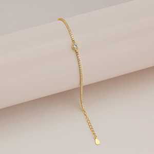 สร้อยข้อมือเทนนิสทอง 14K และเงิน 92.5 พร้อมจี้รูปดอกไม้ทรงกลม ชุบโรเดียมและทอง รุ่น 191310 - Product Image 2