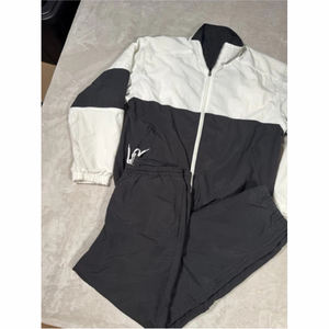 2025 ropa de calle con logotipo personalizado tela tejida tubería blanca bolsillos con cremallera 2 piezas conjunto chándales rompevientos para hombres - Product Image 5