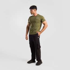 Pantalon décontracté pour homme avec poches flexibles en noir, taille XL, saison hiver/printemps, coupe ajustée en coton tissé avec plis, logo sur la taille - Product Image 4