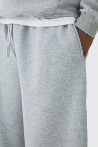 กางเกงแทร็คผ้าฝ้ายเฟรนช์เทอร์รี่ 100% แบบ OEM/ODM สำหรับผู้ชาย ระบายอากาศได้ดี ทรงหลวม น้ำหนักมาก สีเทาเฮเธอร์ - Product Image 5