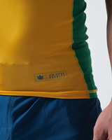 Vente en gros de chemises de surf à manches courtes en spandex/polyester écologiques, anti-UV, imprimées par sublimation, couleur unie, avec logo personnalisé
