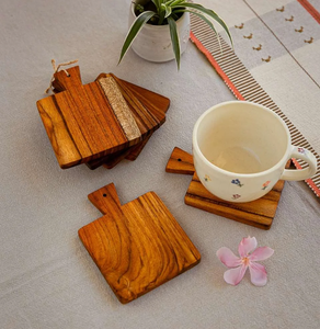 Les sous-verres en bois sont ronds, en bois foncé, avec un magnifique motif floral découpé au laser, disponibles à prix de gros. - Product Image 2