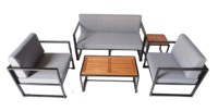 Meubles d'extérieur de luxe pour villa moderne et appartement, salon en rotin PE 4 places, table basse modulaire en acacia, canapé 100% polyester