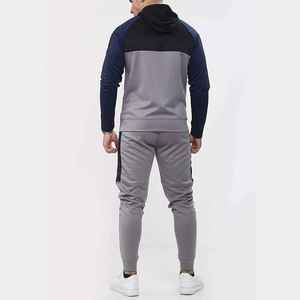 Chándales de bloque de color de último diseño de primavera para hombres/conjunto de chándal de algodón con logotipo personalizado al por mayor logotipo personalizado para hombres - Product Image 1