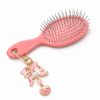 Brosse à cheveux mini coussinée OEM personnalisée avec porte-clés, brosse démêlante portable avec pendentif breloque, brosse à cheveux de voyage en gros