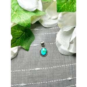 Colgante Navajo Hecho a Mano con Diseño de Montaña Sonora, Plata de Ley, Engaste de Oro Rosa, Incrustaciones de Turquesa, Joyería de Platino con Patrón Numérico - Product Image 1