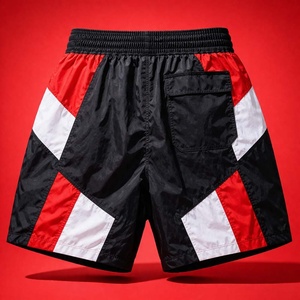 กางเกงขาสั้นวินด์เบรกเกอร์สไตล์เรโทรสำหรับผู้ชาย ผ้าโพลีเอสเตอร์ 100% ใส่สบาย เหมาะสำหรับวิ่งและเล่นกีฬา รับสกรีนโลโก้ - Product Image 2