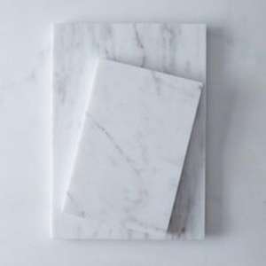 Tabla de cortar de mármol duradera y ecológica con un acabado pulido elegante que proporciona estilo y sostenibilidad en la cocina - Product Image 1