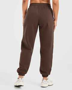 Vente en gros de pantalons de jogging classiques en peluche marron pour femmes, tissu polaire doux au toucher, taille élastique, pantalons de survêtement de rue - Product Image 5