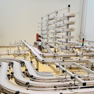 Sistema Circular de Rodillos Transportadores de Acumulación Tipo S Alpine para Líneas de Producción Industrial - Product Image 1