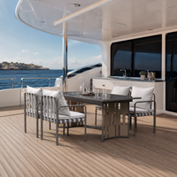 Ensemble de table et chaises de salle à manger d'extérieur en acier inoxydable avec fauteuils en sangles tressées pour projets de complexes hôteliers, restaurants et clubs nautiques