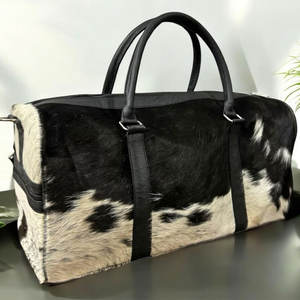 Most Popular Winter Wear Custom <b>Men</b> Cowhide <b>Leather</b> <b>Duffle</b> <b>bags</b> New Fashion Design Fur Cowhide <b>Leather</b> <b>Duffle</b> <b>bags</b> For <b>Men</b> - Product Image 2