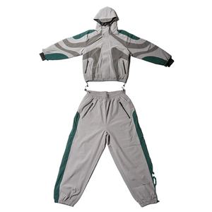 Conjunto Deportivo Informal de Dos Piezas con Cremallera, Sudadera con Capucha y Pantalones Jogger Ligeros de Nylon 100% de Secado Rápido - Product Image 1