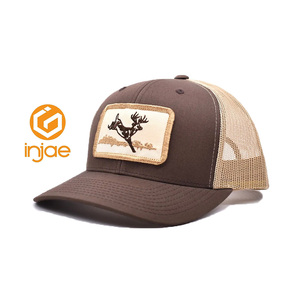 Gorras Trucker Personalizadas al por Mayor ODM/OEM con Parche Tejido con Logotipo, Gorras Deportivas de 6 Paneles Estructuradas con Malla Transpirable en la Parte Trasera y Visera Precurvada - Product Image 1