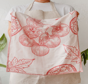 Large white cotton kitchen towel featuring a vintage red tomato vine print. Available at wholesale prices. - Product Image 1