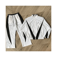 Ensemble de survêtement coupe-vent de haute qualité Ensemble coupe-vent d'été décontracté avec logo personnalisé Survêtement en nylon pour homme Ensemble court coupe-vent
