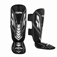 Protège-tibias TOPN MMA Muay Thai personnalisés en usine, en PU, pour adultes, entraînement de kickboxing, protection professionnelle, légers et souples, pour la boxe sur pied