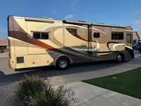 Camping-car d'occasion 2010 C-O-U-N-T-R-Y RV C-O-A-C-H INSPIRE 360 VENICE disponible à la vente
