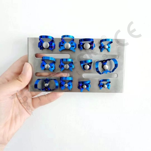 คีมหนีบไทเทเนียมสีฟ้าแบบอัตโนมัติชุดยางเขื่อนแบบแมนนวลเครื่องมือจัดฟันได้รับการรับรอง CE จากเยอรมัน12ชิ้น - Product Image 1