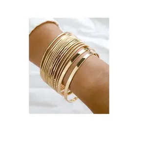 Brazalete de latón de alta calidad, joyería de acero inoxidable chapada en oro y pieza de diseño de manguito y producto simple