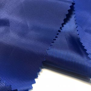 Tela antirterciopelo horizontal de nailon 20D con diseño de logotipo personalizado OEM para protección contra el frío tela impermeable de protección solar - Product Image 5