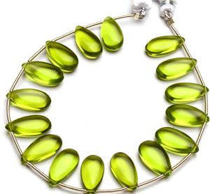 Coszcalt Exports Peridot Hydro Gemstone Green Color Glass Quartz 15x7mm Smooth Pear Shape Beads Third Party Appraised for - Product Image 3