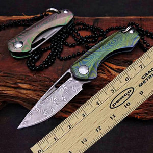 Vente en gros de lames PRESTIGE personnalisables OEM PB-FK-0275 couteau de poche pliant en acier Damas 110 couches 9Cr18MoV manche en titane - Product Image 4