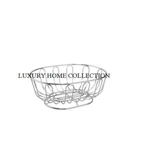 Cesta de frutas de metal tejida a mano con una estructura duradera hecha para durar a través del uso diario frecuente - Product Image 1