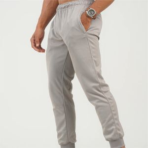 Ventes en gros de pantalons de jogging légers et décontractés pour hommes, avec poches, logo personnalisé, séchage rapide, respirant, pour le sport, la remise en forme et l'entraînement - Product Image 6