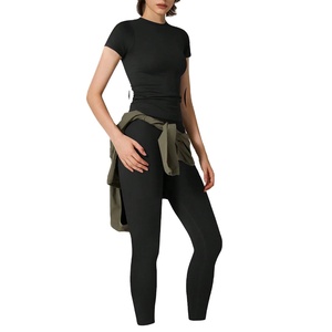 Ensemble d'entraînement pour femmes OEM personnalisé tissu côtelé respirant t-shirt leggings séchage rapide tenue athlétique bouton de dentelle pour le sport yoga - Product Image 1