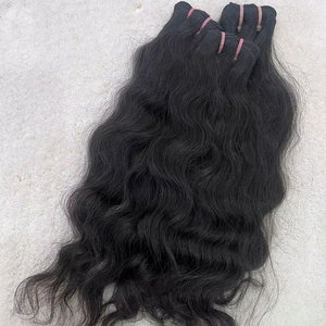 Extensions de trame de cheveux Remy de temple indien brut non transformés en lot doux attaché à la main avec des styles de boucles de vague brésiliennes - Product Image 1