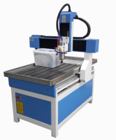 Machine de gravure sur bois CNC à changement d'outil automatique de haute efficacité pour la fabrication professionnelle de panneaux de meubles en bois