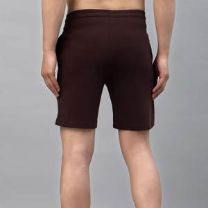 กางเกงขาสั้นออกกำลังกายสำหรับผู้ชายน้ำหนักเบายืดได้สีพื้นและโลโก้ที่ปรับแต่งได้ - Product Image 2