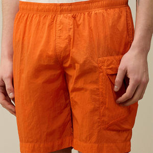 กางเกงขาสั้นคาร์โก้โพลีเอสเตอร์สำหรับผู้ชายกางเกงไฮสตรีทแข็งแรงเป็นมิตรกับสิ่งแวดล้อมสีส้มสดใสมีกระเป๋าด้านข้างเอวยางยืดสำหรับชุดลำลองฤดูร้อน - Product Image 6
