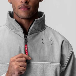Veste à fermeture éclair quart pour homme avec matériau durable, parfaite pour les activités de plein air et un usage quotidien - Product Image 4