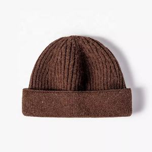 Vente en gros de bonnets d'hiver décontractés en molleton 100% coton imperméable, logo personnalisé brodé, couvre-chef d'extérieur, fermeture à pression, unisexe - Product Image 5