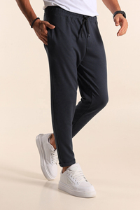 Pantalones de hombre de otoño cálidos y ligeros, acampanados, tallas grandes, casuales, deportivos, de cintura media, de algodón, de ajuste holgado, con cordón y bolsillos. - Product Image 4