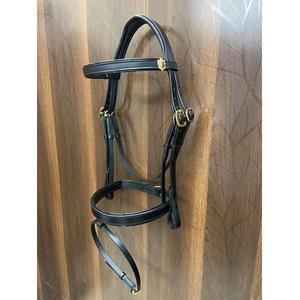 Brida de filete negra ecuestre con ribete de charol y acolchado con herrajes de latón - Product Image 1